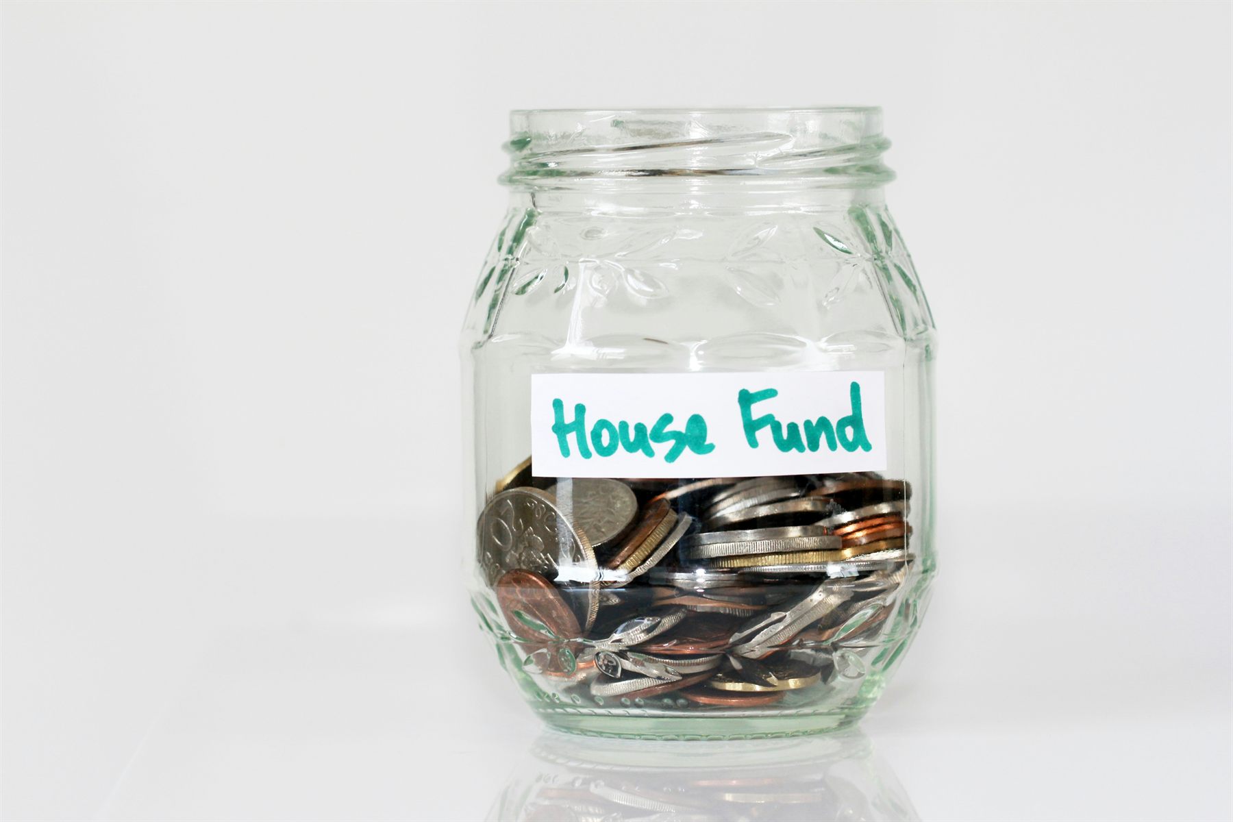 A house fund jar used to represent rental property expenses