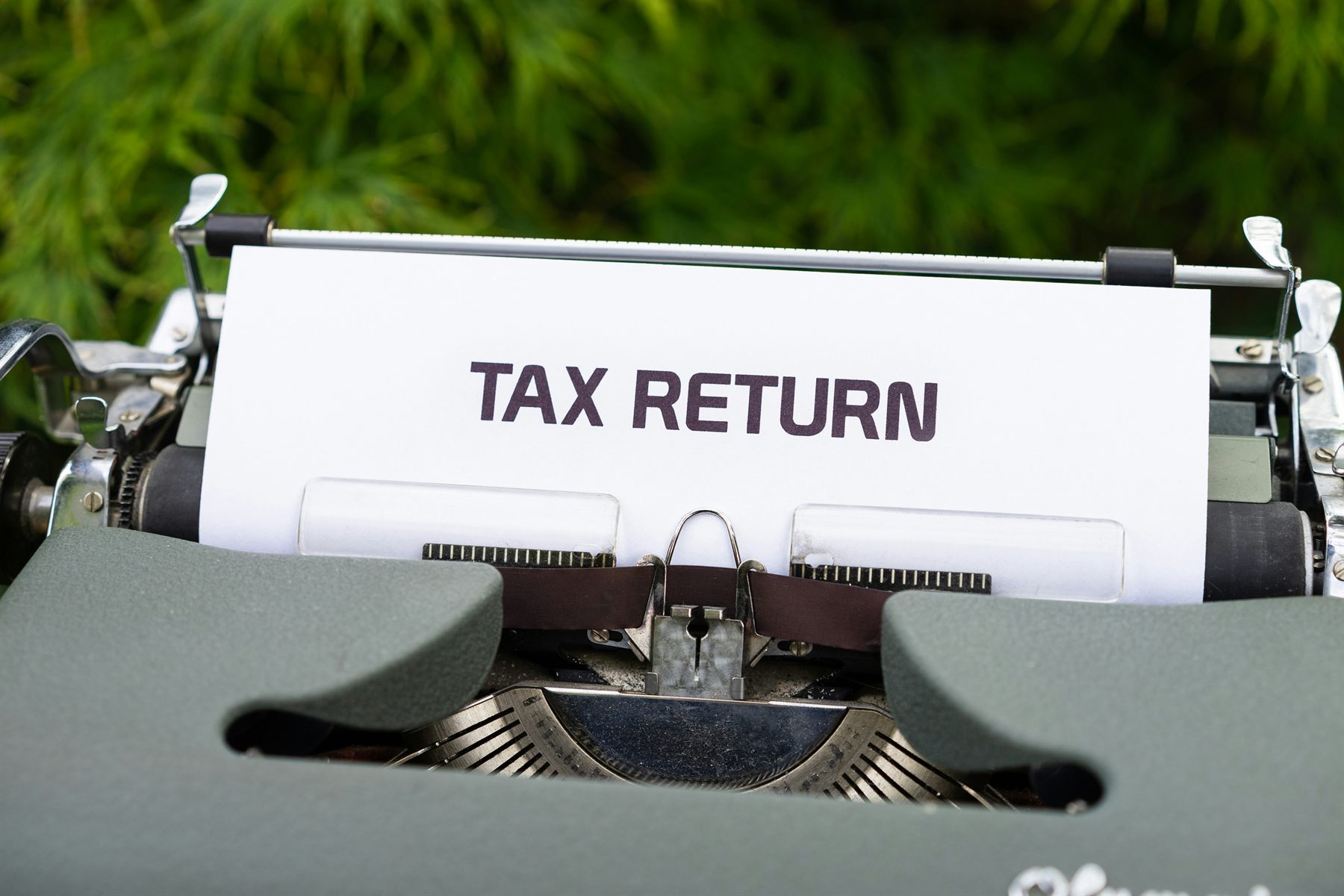 A tax return form in a typewriter